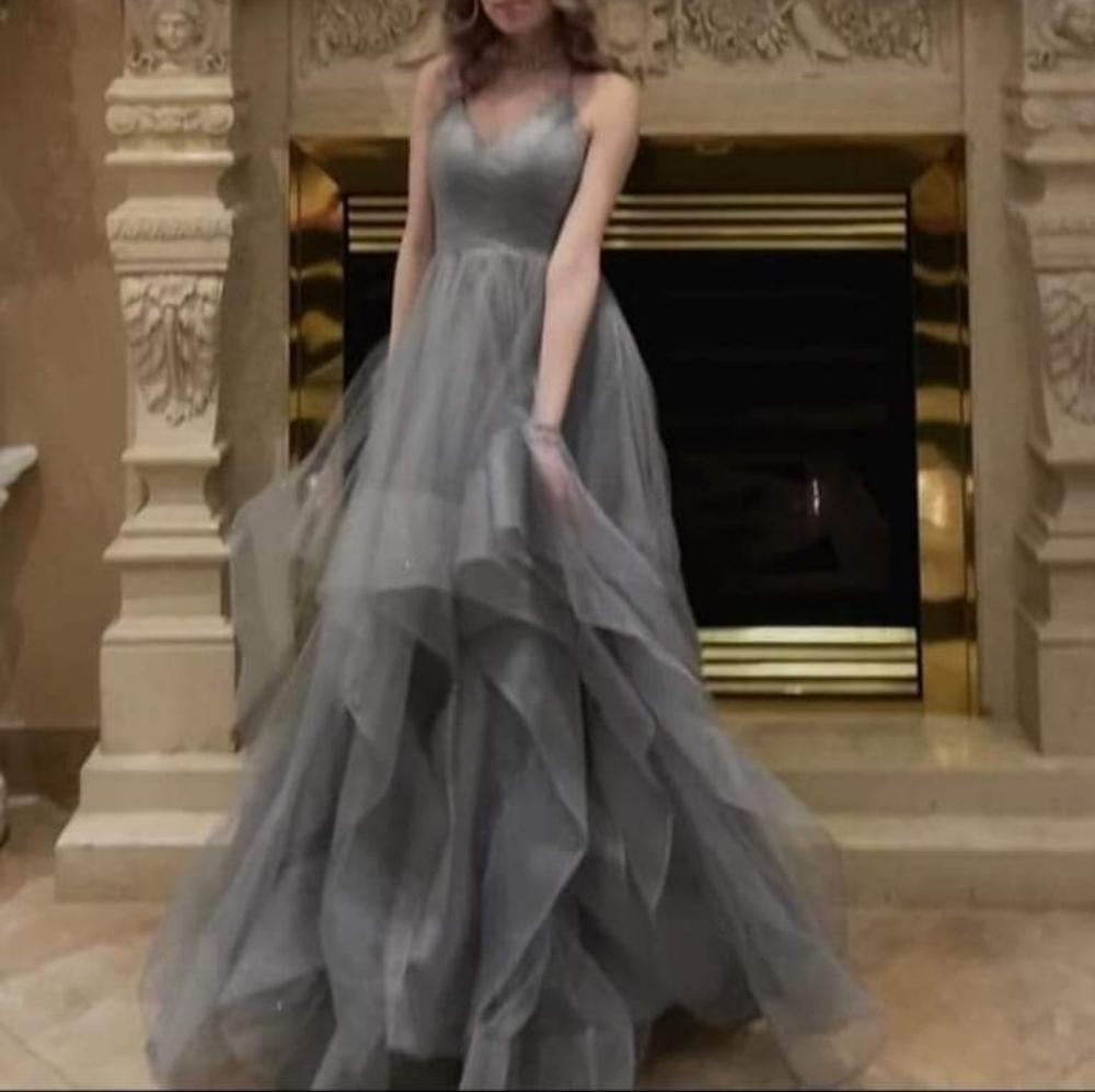 Gorgeous silvery and sparkly gown. Perfect for weddings, PROM, new years eve etc